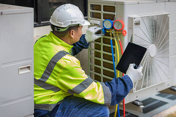 Professional Air Conditioning Repair technician working in Glen Oaks, NY